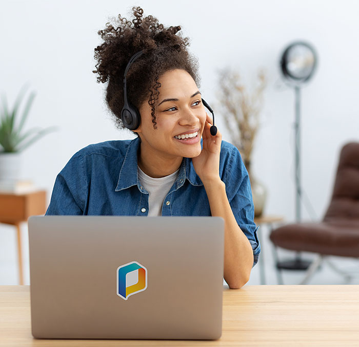 PhotoShelter employee smiling while providing exceptional customer service.